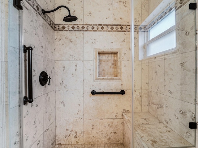 full bath featuring a shower stall