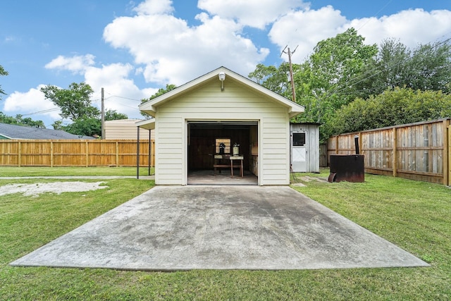 view of shed with a fenced backyard