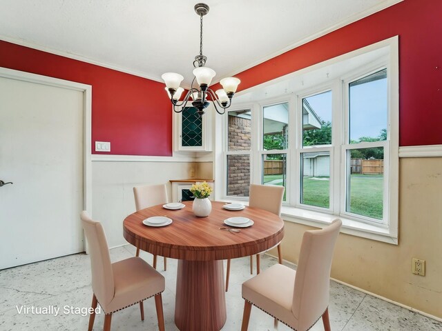 106 Faith St, Highlands, TX 77562 - dining area with a chandelier, plenty of natural light, and baseboards
