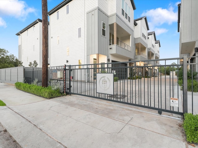 view of gate featuring fence