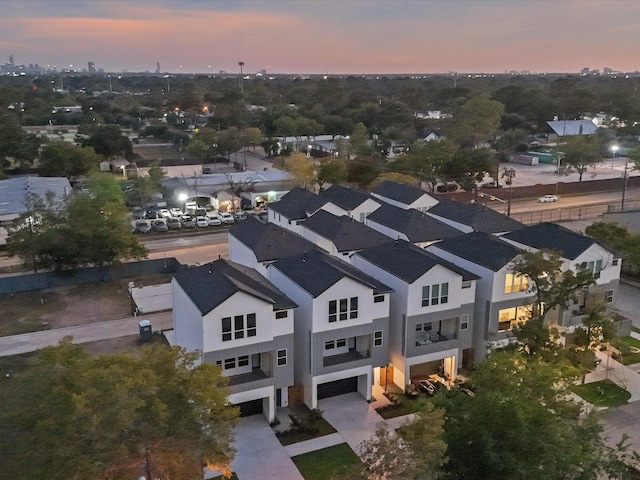 aerial view at dusk with a residential view