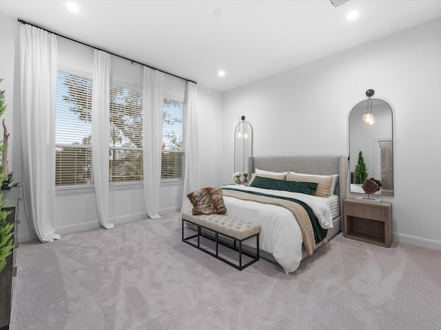 bedroom with carpet floors, baseboards, and recessed lighting