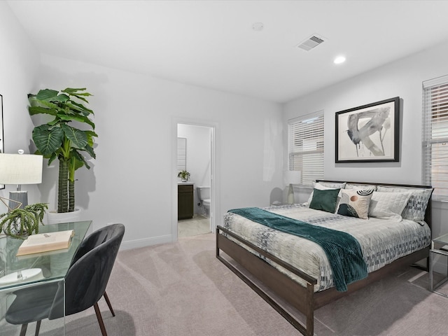 bedroom featuring visible vents, recessed lighting, baseboards, and light carpet