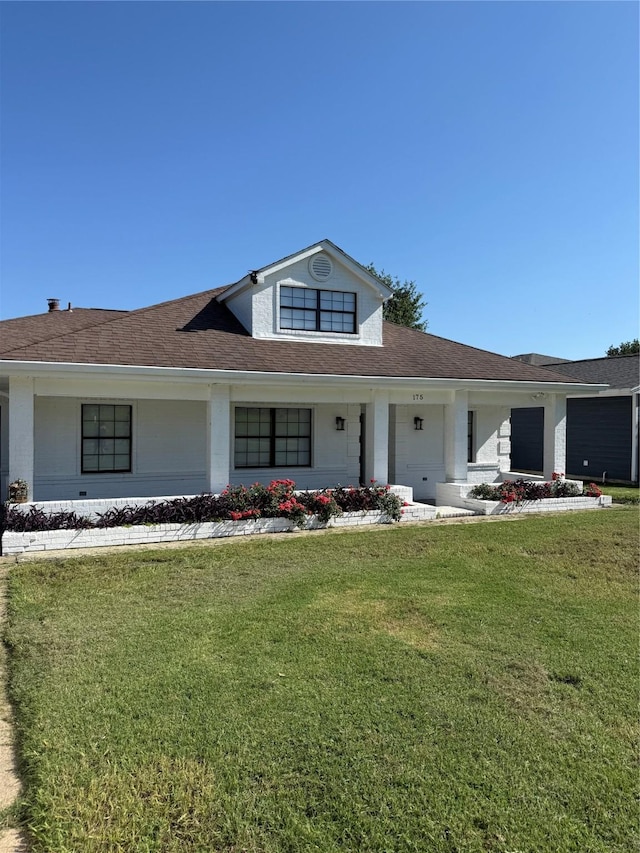 175 Heather Ln, Livingston, TX 77351 - view of front of house with roof with shingles and a front lawn