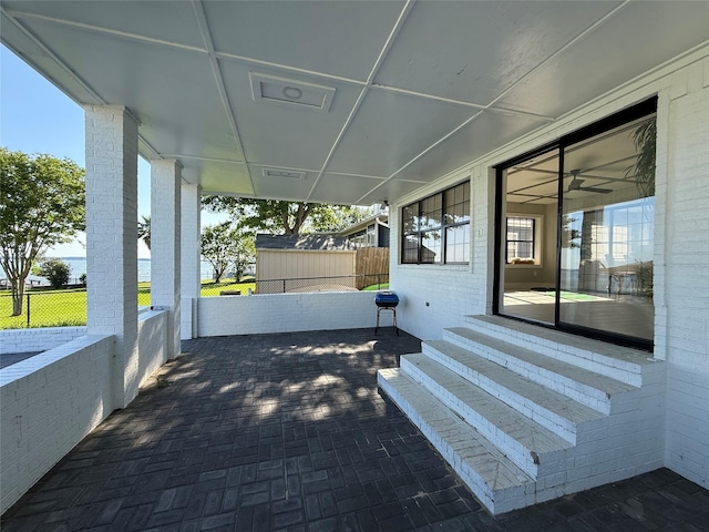 175 Heather Ln, Livingston, TX 77351 - view of patio featuring fence and entry steps