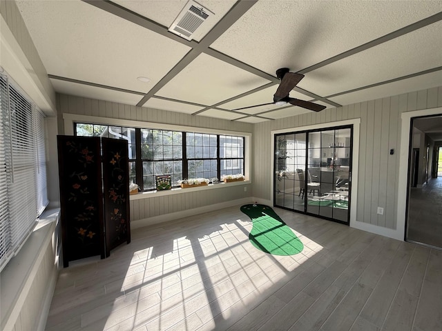 175 Heather Ln, Livingston, TX 77351 - unfurnished sunroom featuring beamed ceiling and visible vents