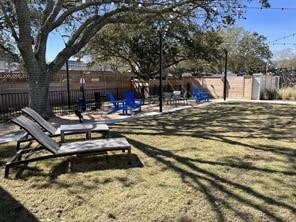 surrounding community featuring fence