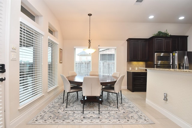dining area featuring baseboards, recessed lighting, visible vents, and plenty of natural light