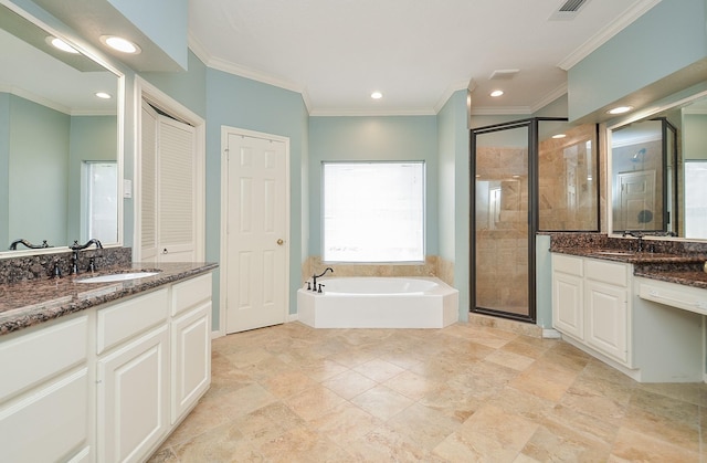 bathroom featuring a garden tub, crown molding, a stall shower, a sink, and recessed lighting