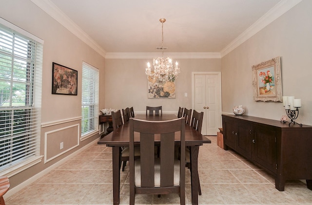 dining area featuring ornamental molding, a chandelier, a healthy amount of sunlight, and light tile patterned floors