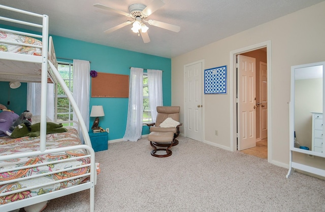 3510 S Lake Village Dr, Katy, TX 77450 - carpeted bedroom featuring multiple windows, baseboards, and a ceiling fan