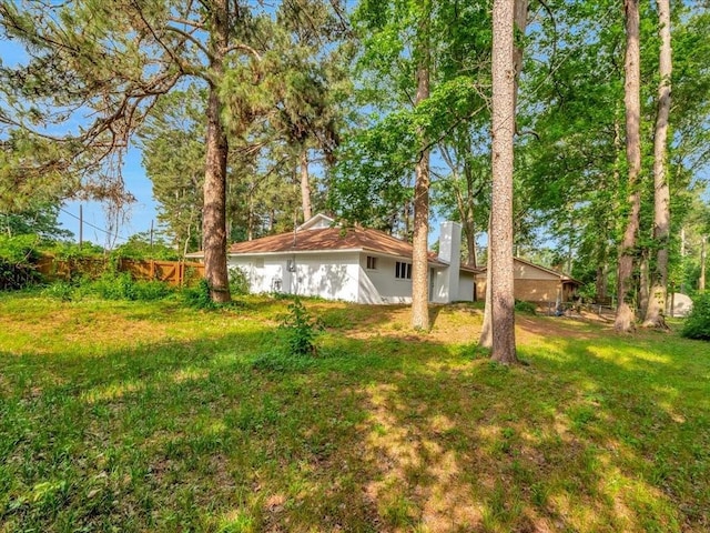 view of yard with fence