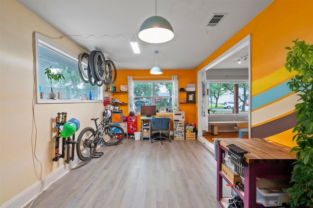 4811 Saxon St, Bellaire, TX 77401 - office space with visible vents, baseboards, and wood finished floors