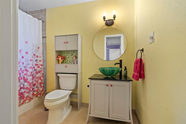 4811 Saxon St, Bellaire, TX 77401 - bathroom featuring vanity, tile patterned floors, toilet, and a shower with curtain