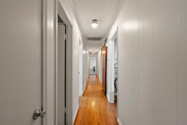4811 Saxon St, Bellaire, TX 77401 - corridor featuring light wood finished floors and visible vents