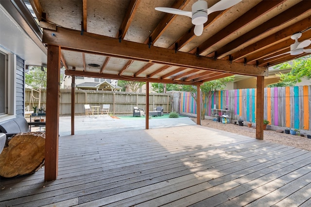 4811 Saxon St, Bellaire, TX 77401 - wooden terrace with a fenced backyard and ceiling fan