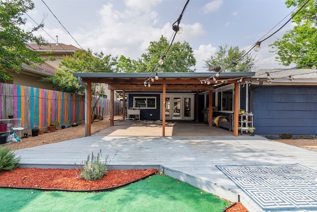4811 Saxon St, Bellaire, TX 77401 - back of house with a deck, fence, and french doors
