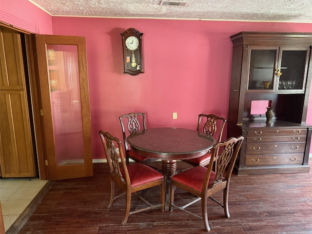 1130 Hoffman St, Houston, TX 77020 - dining room with hardwood / wood-style floors