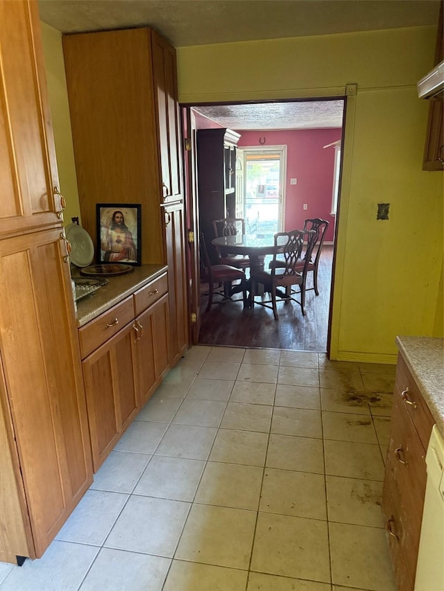 1130 Hoffman St, Houston, TX 77020 - corridor featuring light tile patterned floors