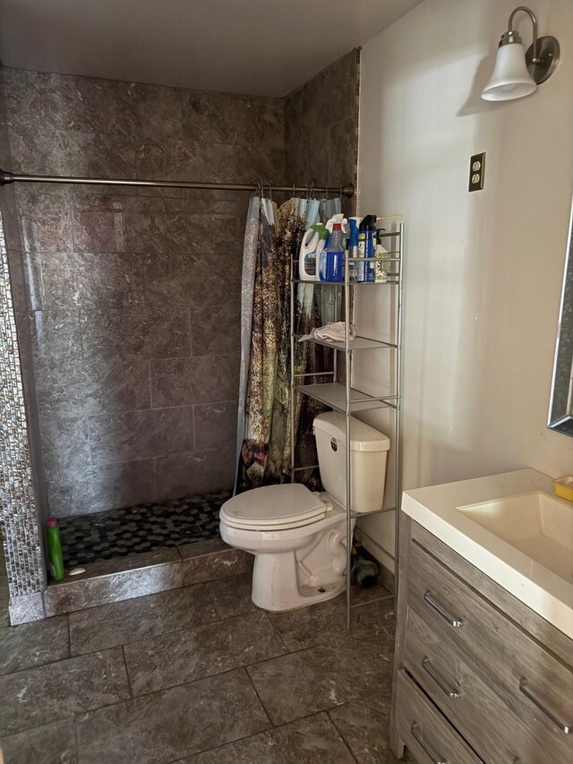 1130 Hoffman St, Houston, TX 77020 - bathroom featuring a shower stall, toilet, and vanity