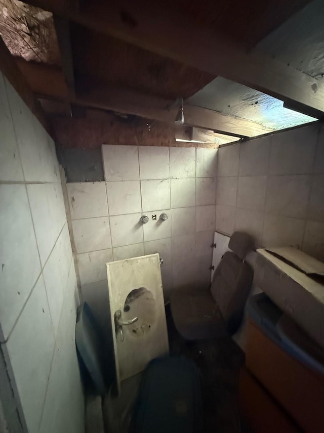 1130 Hoffman St, Houston, TX 77020 - unfinished basement with tile walls