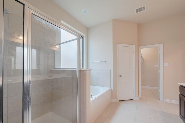 bathroom featuring vanity, tile patterned floors, a shower stall, visible vents, and a bath