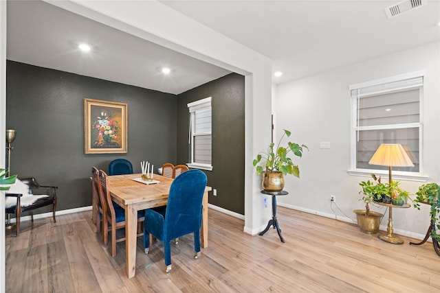 dining space featuring recessed lighting, baseboards, light wood finished floors, and visible vents