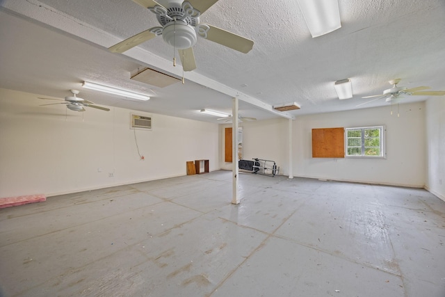 2234 Kelly Dr, Pearland, TX 77581 - basement featuring a ceiling fan and a textured ceiling