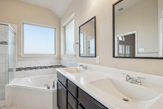 4310 Treccia Ct, Katy, TX 77493 - full bath with a bath, a tile shower, vaulted ceiling, and double vanity