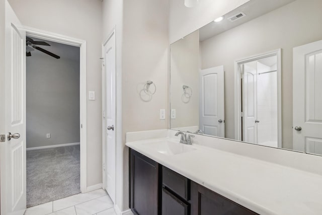 4310 Treccia Ct, Katy, TX 77493 - bathroom with ceiling fan, tile patterned flooring, vanity, and baseboards