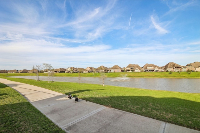 4310 Treccia Ct, Katy, TX 77493 - view of grassy yard featuring a residential view and a water view