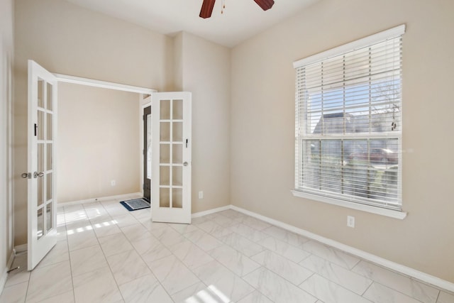 4310 Treccia Ct, Katy, TX 77493 - unfurnished room featuring french doors, a ceiling fan, and baseboards