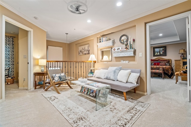 carpeted living area featuring crown molding, a ceiling fan, baseboards, and recessed lighting