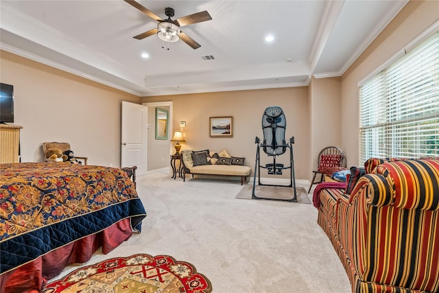 carpeted bedroom featuring crown molding, a raised ceiling, recessed lighting, baseboards, and visible vents