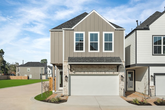 view of front of property featuring a garage, driveway, board and batten siding, brick siding, and roof with shingles
