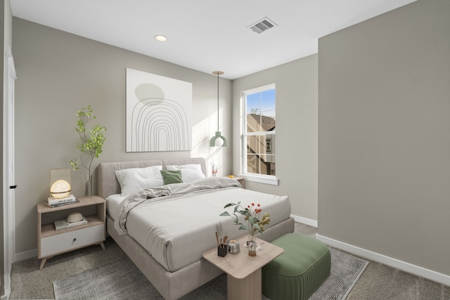 carpeted bedroom with baseboards, recessed lighting, and visible vents