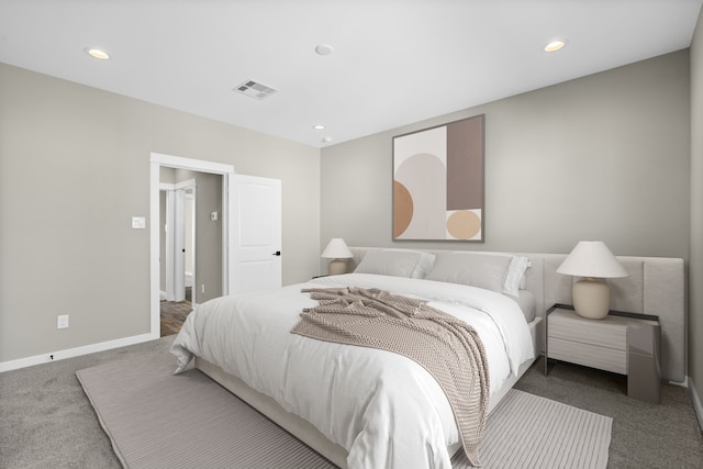 carpeted bedroom featuring baseboards, recessed lighting, and visible vents