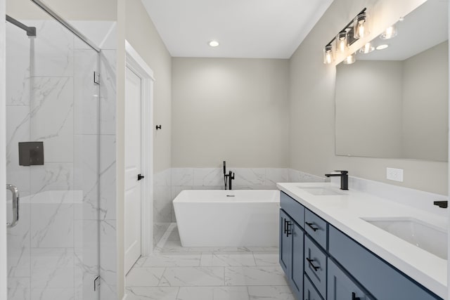 bathroom with recessed lighting, a marble finish shower, marble finish floor, and a sink