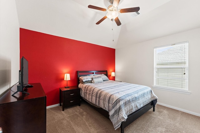 carpeted bedroom with a ceiling fan, baseboards, vaulted ceiling, and visible vents