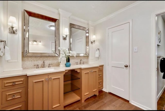 bathroom with wood finished floors, a sink, and tasteful backsplash