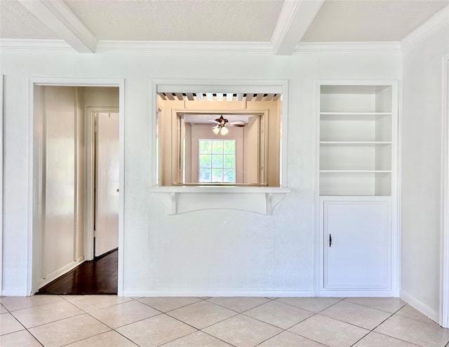 8315 Lichen Ln, Spring, TX 77379 - unfurnished dining area with ornamental molding, light tile patterned floors, built in shelves, a textured ceiling, and beamed ceiling