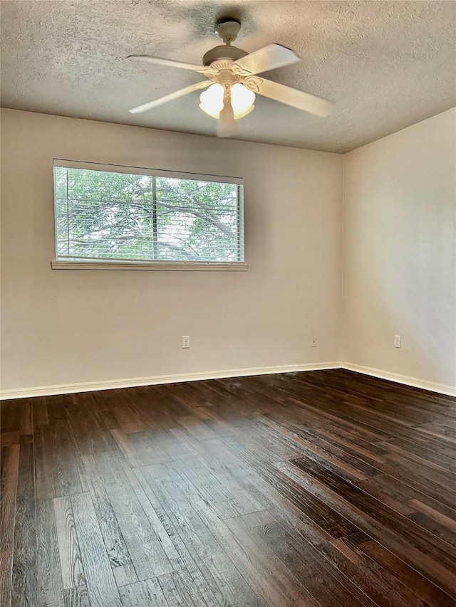 8315 Lichen Ln, Spring, TX 77379 - spare room with plenty of natural light, wood-type flooring, a ceiling fan, a textured ceiling, and baseboards