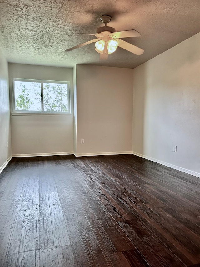 8315 Lichen Ln, Spring, TX 77379 - unfurnished room featuring a ceiling fan, dark wood finished floors, a textured ceiling, and baseboards