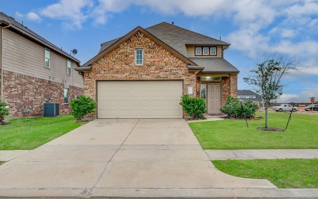 3539 Rossini Dr, Katy, TX 77493 - traditional-style home featuring brick siding, a front lawn, concrete driveway, and cooling unit