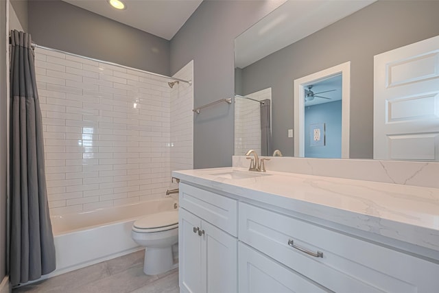 4318 E Center St, Houston, TX 77007 - bathroom with vanity, toilet, ceiling fan, and shower / tub combo with curtain
