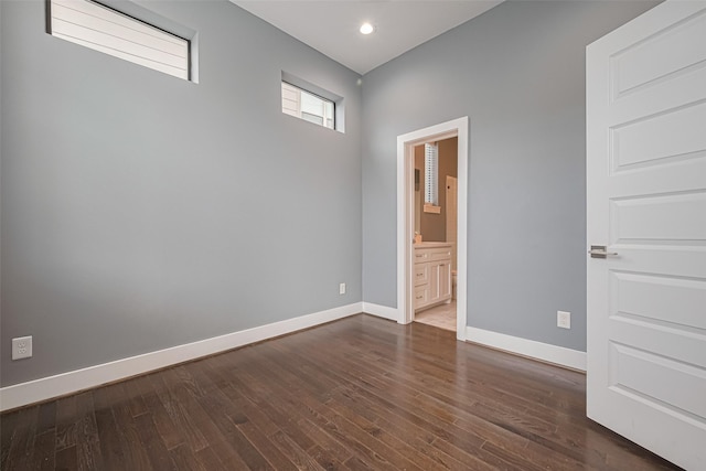 4318 E Center St, Houston, TX 77007 - spare room featuring dark wood-style flooring, baseboards, and recessed lighting