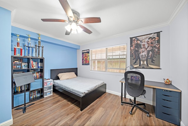12633 Memorial Dr Unit 83, Houston, TX 77024 - bedroom with baseboards, ornamental molding, a ceiling fan, and wood finished floors