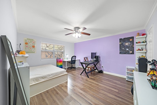 12633 Memorial Dr Unit 83, Houston, TX 77024 - bedroom featuring crown molding, a ceiling fan, baseboards, and wood finished floors