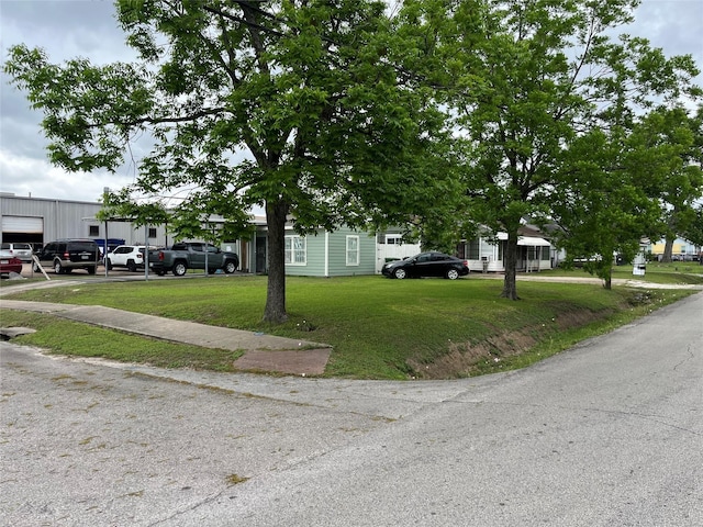 view of front of home with a front lawn