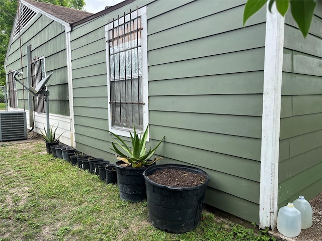 view of property exterior with central AC unit